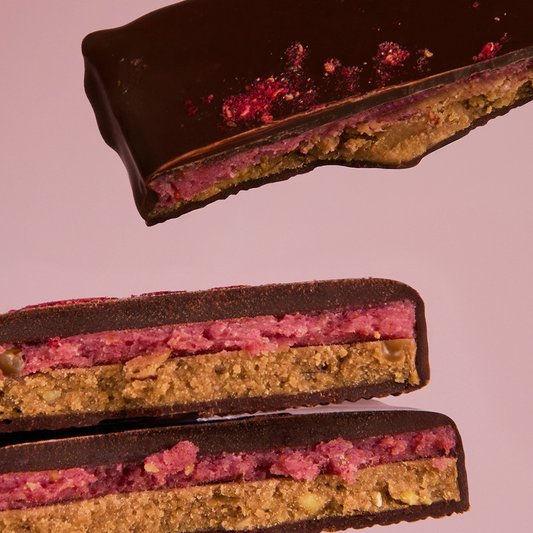Cosmic Dealer - Nut Butter Chocolate Double layer Raspberry & Pistachio 20g - WERTE FREUNDE